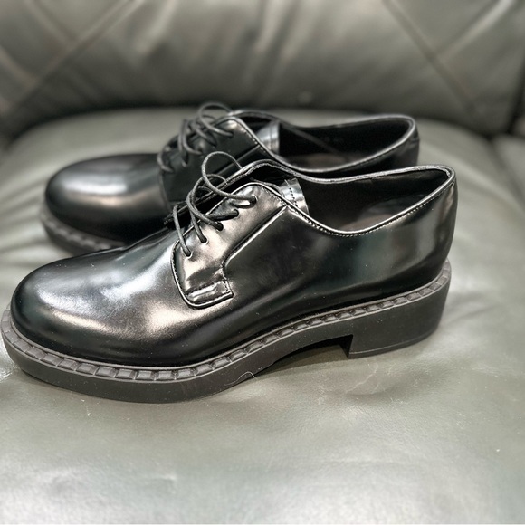 Prada laced loafers